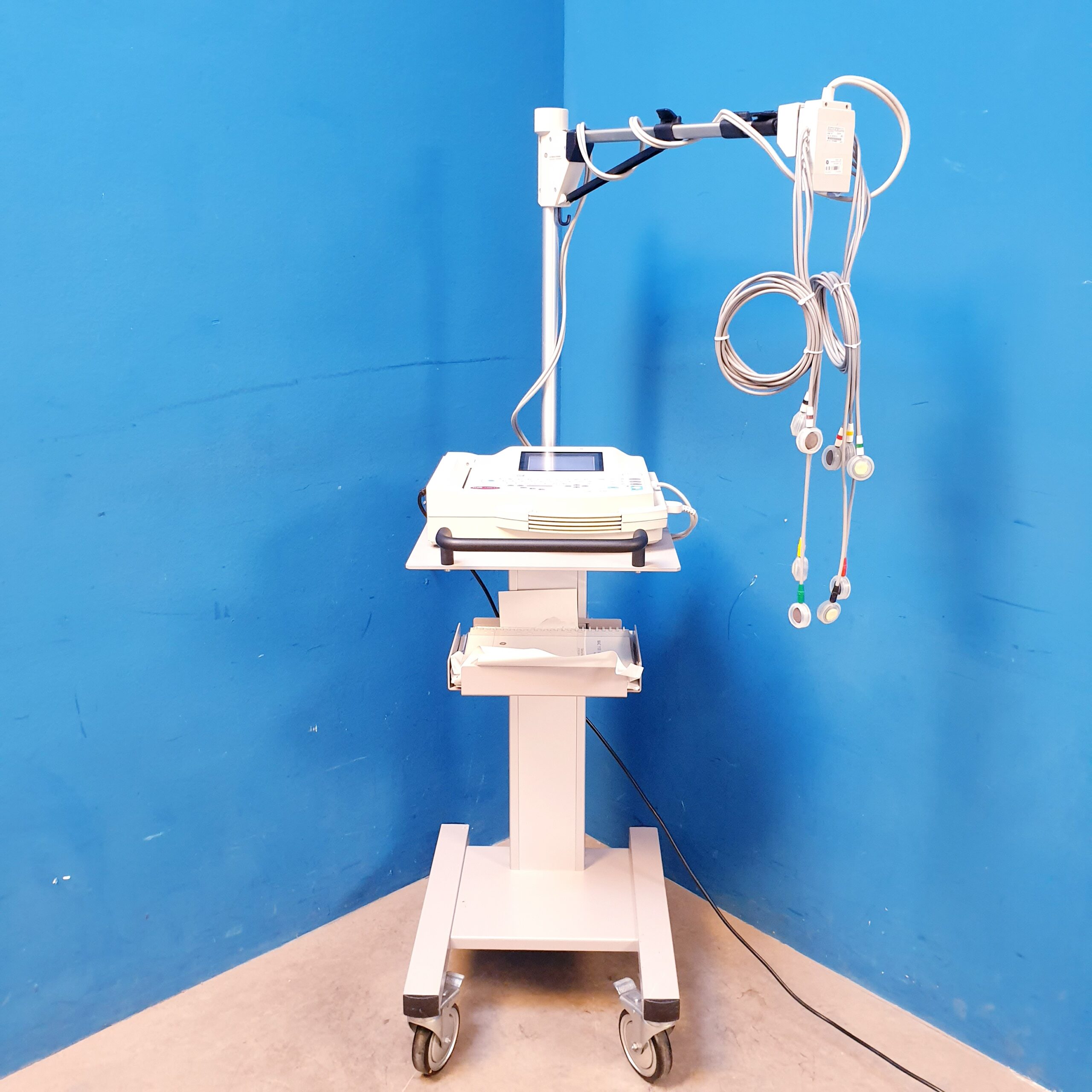 GE MAC 1200 ST EKG-Gerät + Sauganlage