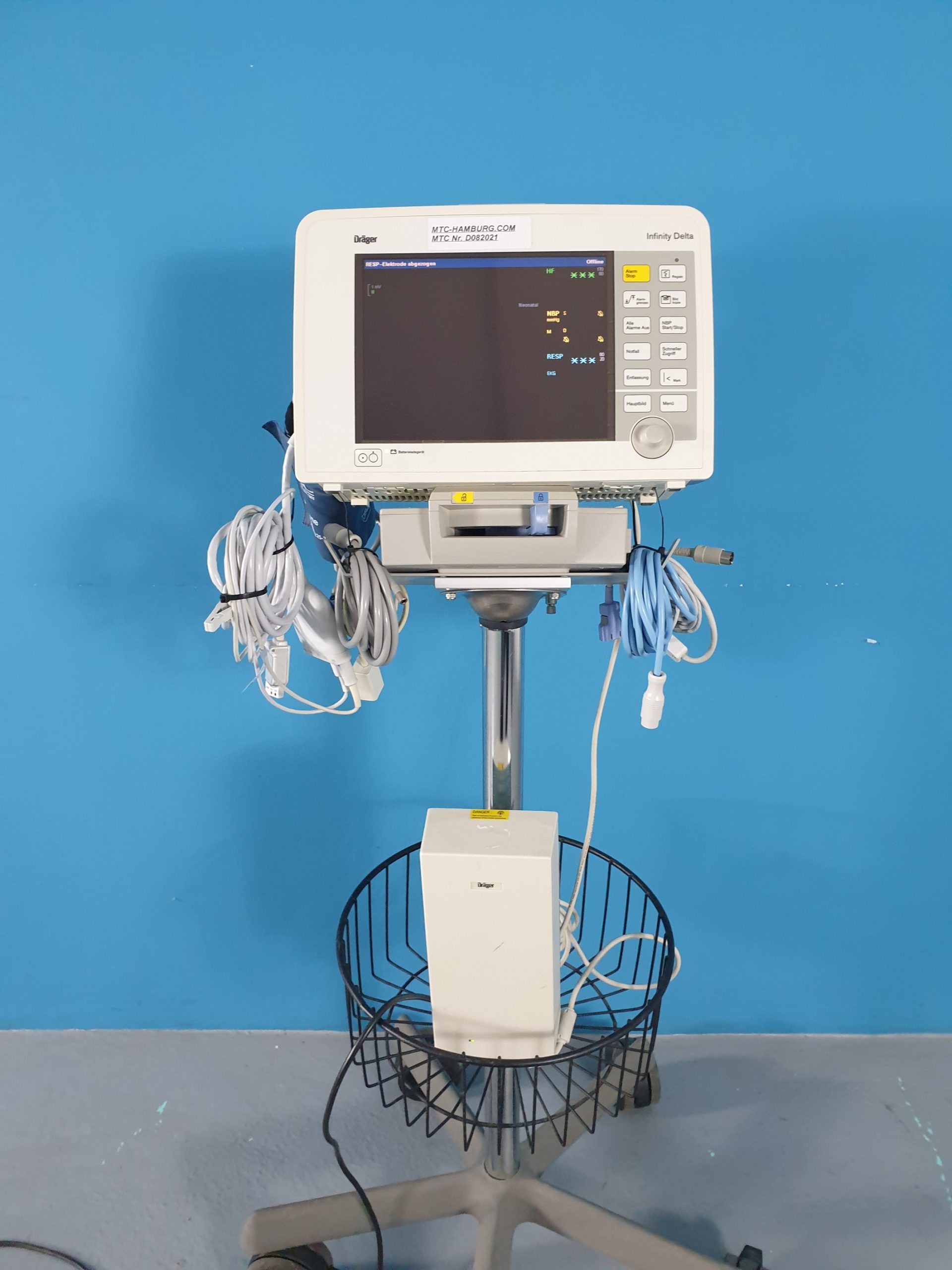Dräger , Draeger Patientenmonitor Infinity Delta mit Dockingstation, Netzteil und Zubehör auf Farbarem Gestell